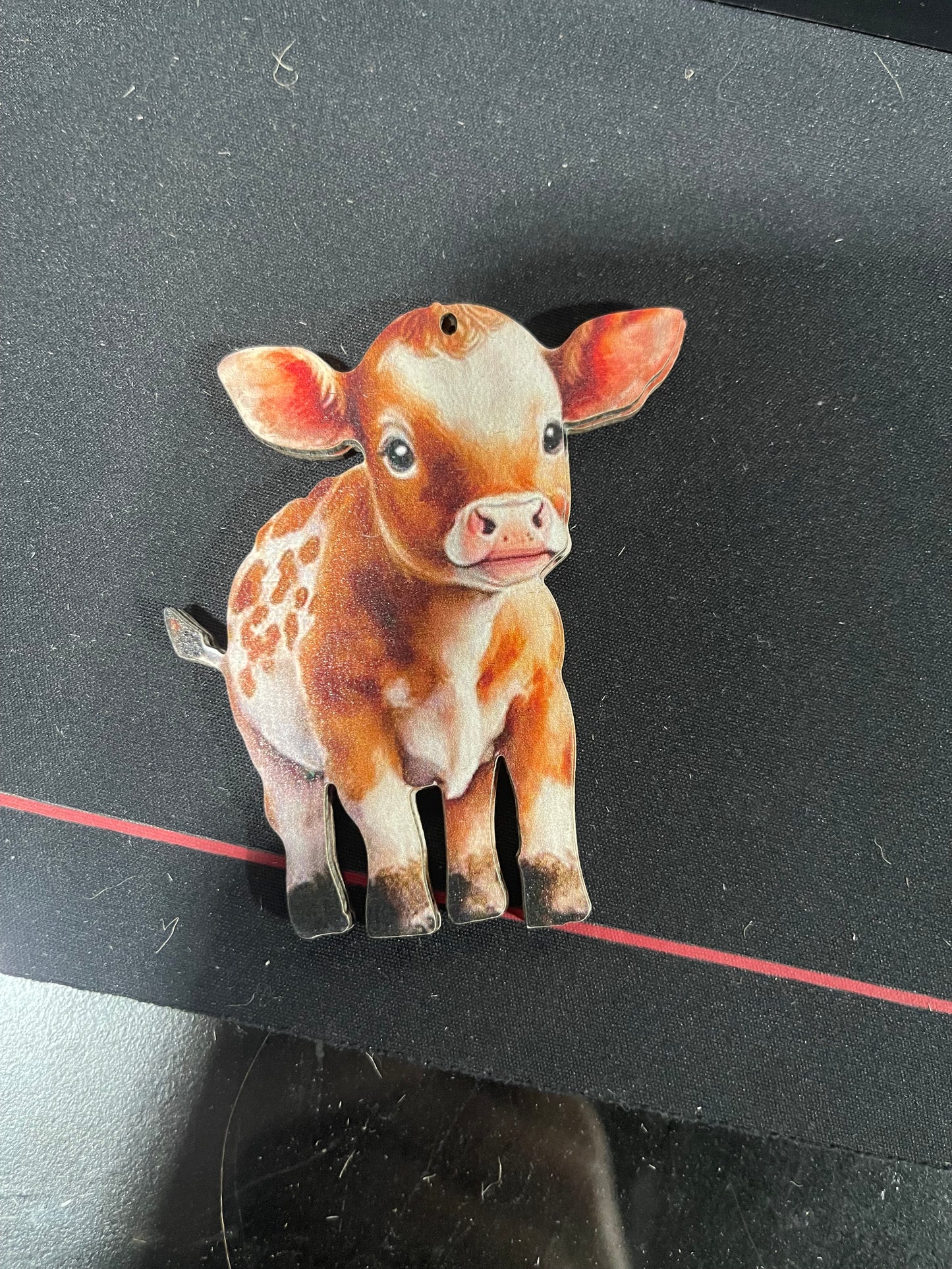 wooden cow ornaments