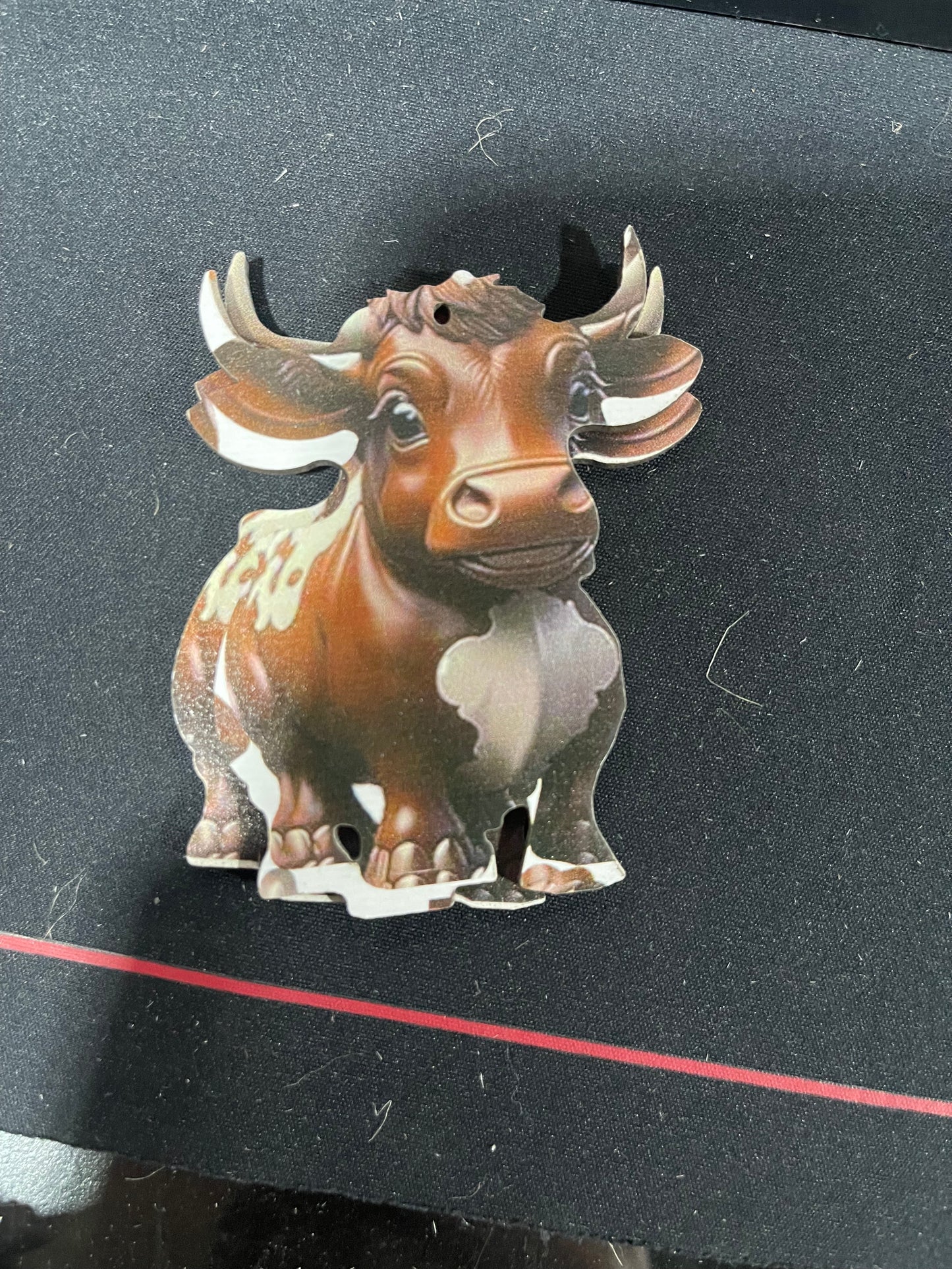 wooden cow ornaments